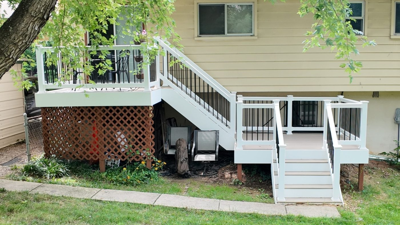 Deck with paver patio and stair lights