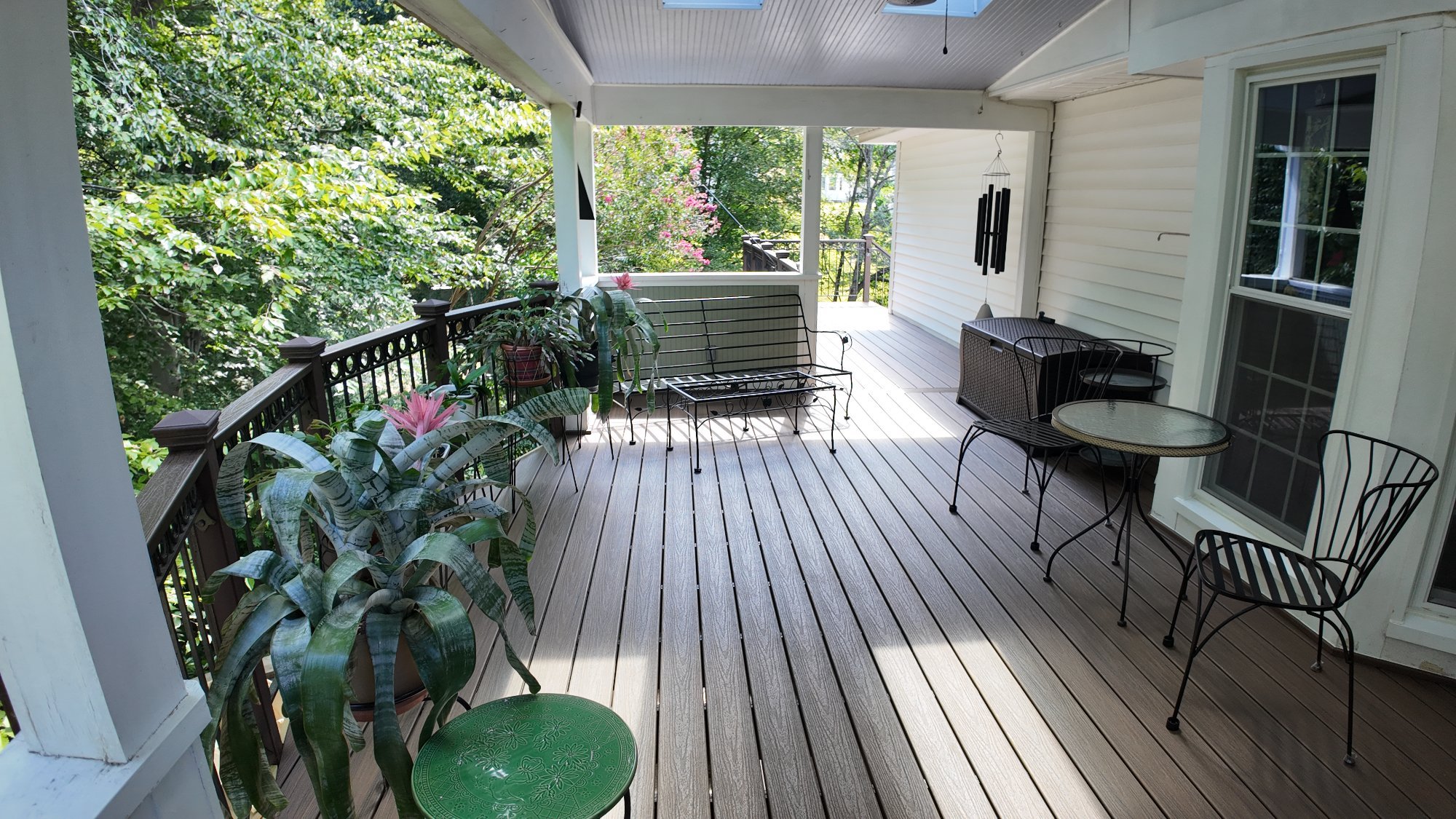 Trex composite deck with outdoor dining built by Stoneridge in Fredericksburg Virginia