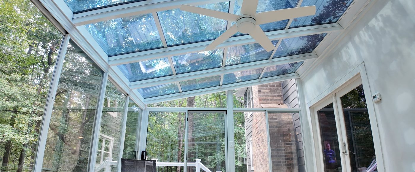 Cathedral sunroom interior with glass ceiling built by Stoneridge Decks in Virginia