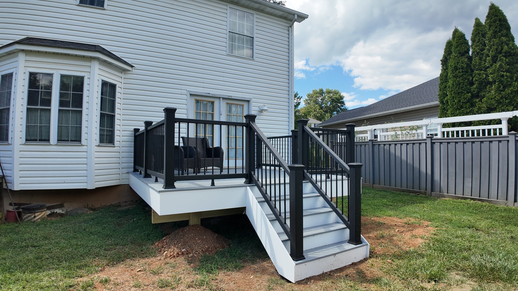 Composite deck with hidden fasteners and white railing stairs Martinsburg Virginia