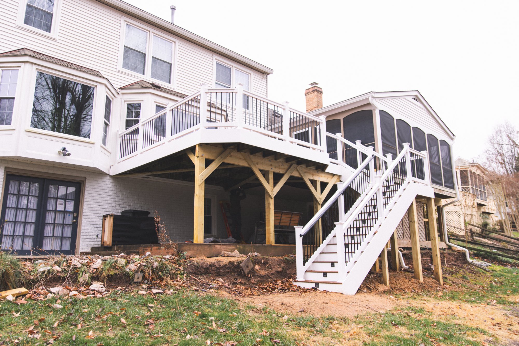 Aerial view deck with screen porch and covered sunroom