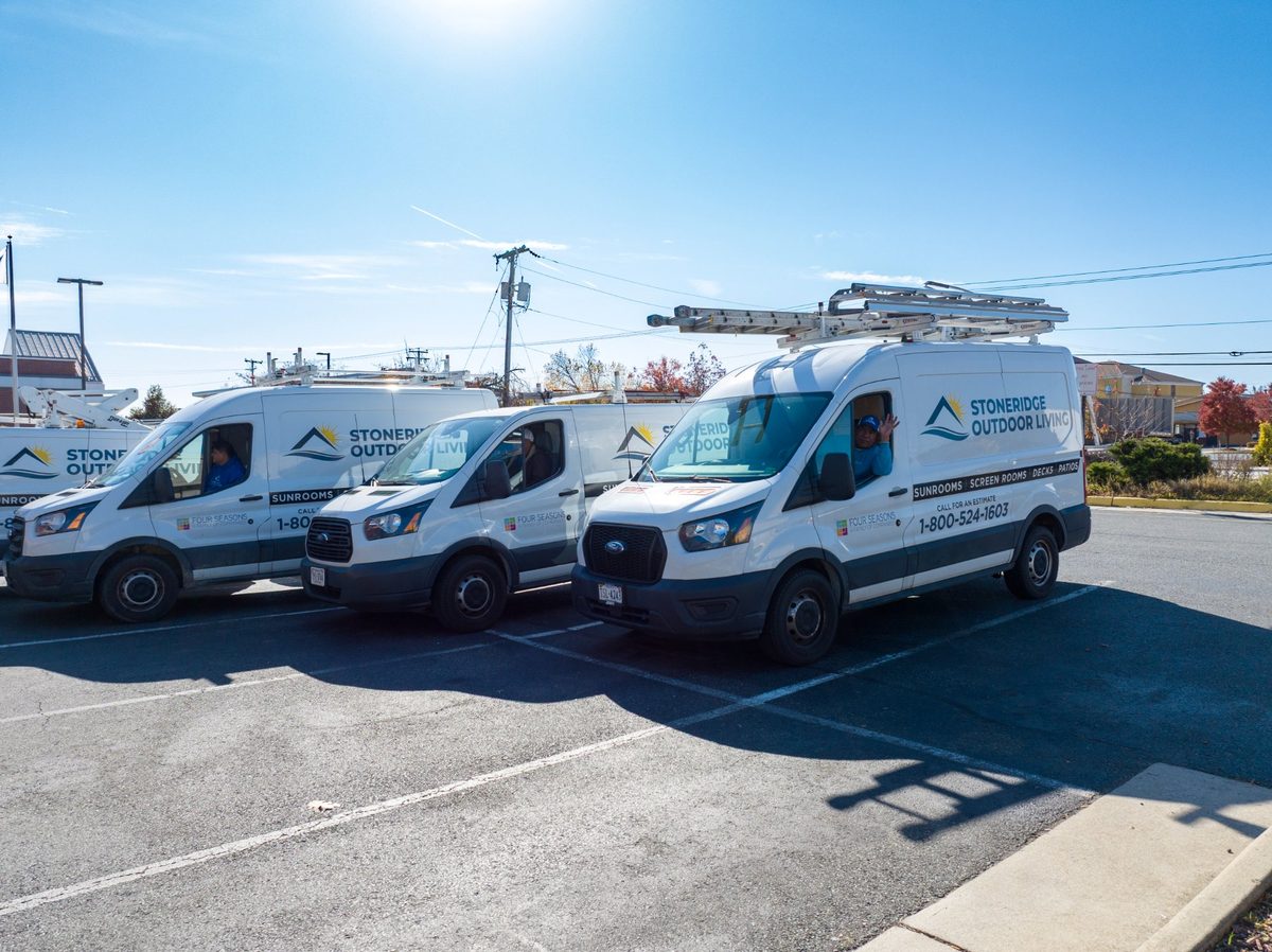 Stoneridge Decks crew vans lined up ready for work