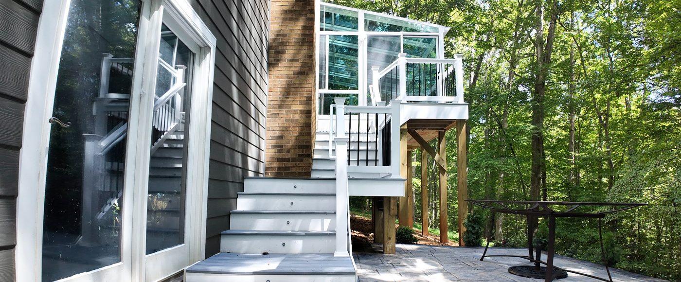 Stoneridge Decks blog — elevated deck with white railing drone photo
