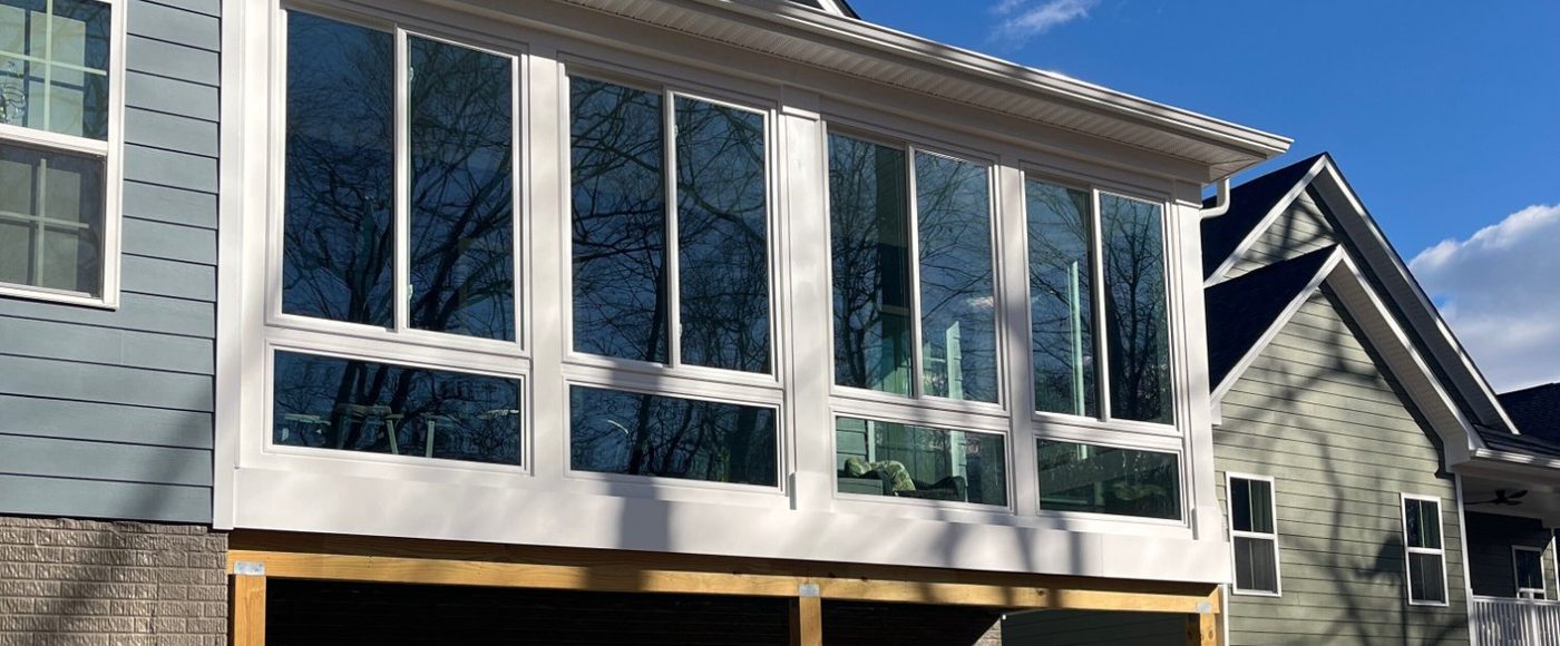 Elevated porch enclosure with windows built by Stoneridge Decks in Virginia