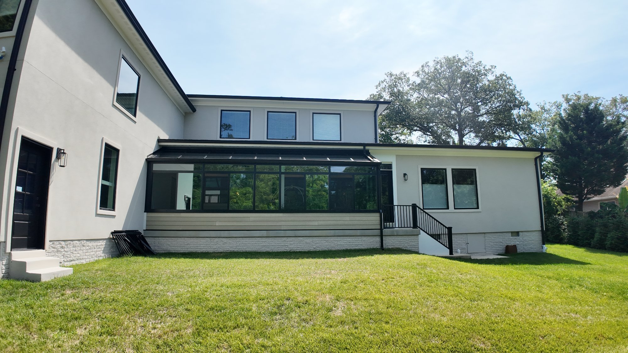 Raised paver patio with retaining wall