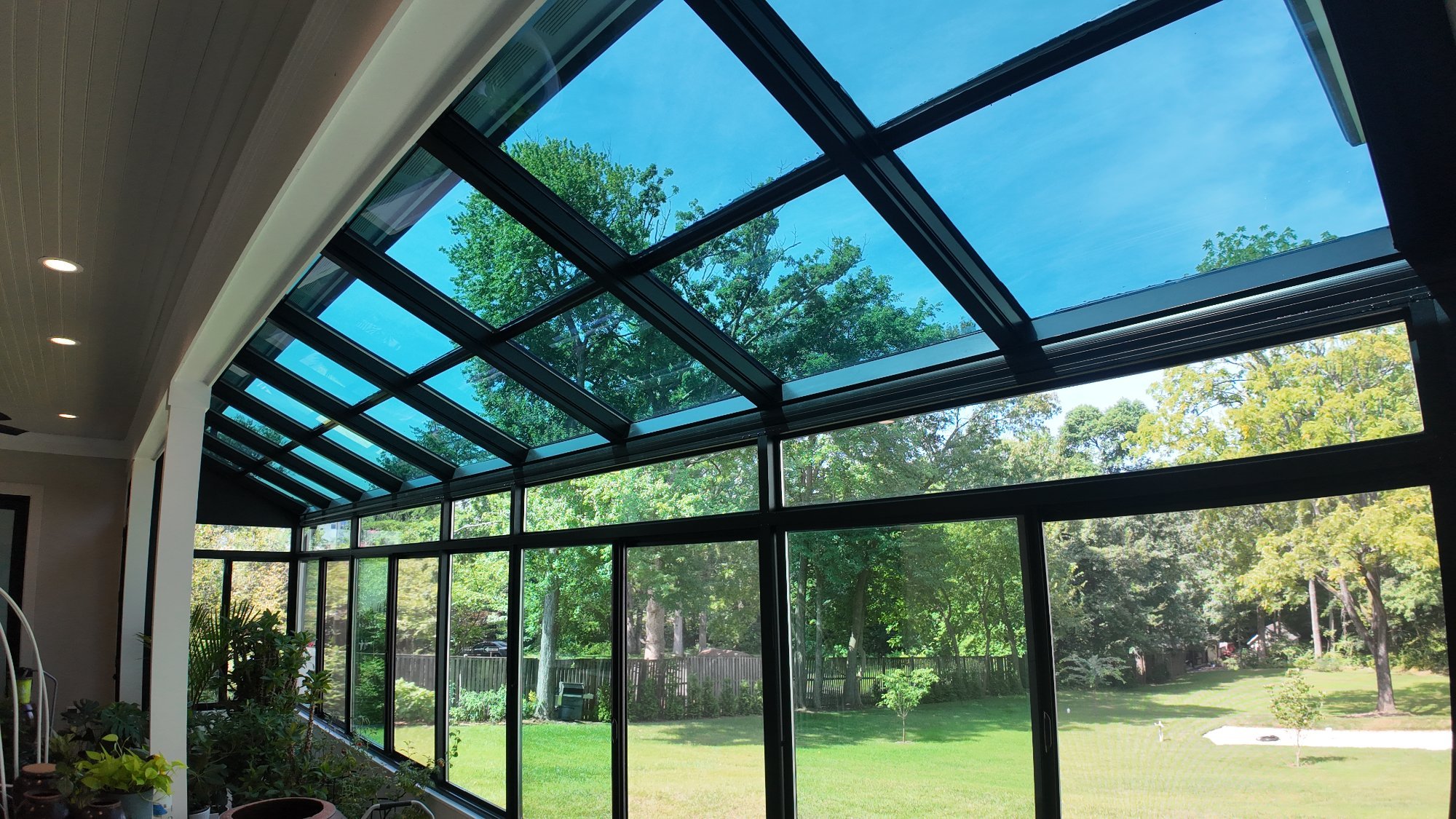 Modern sunroom ground level exterior built by Stoneridge Decks in Virginia