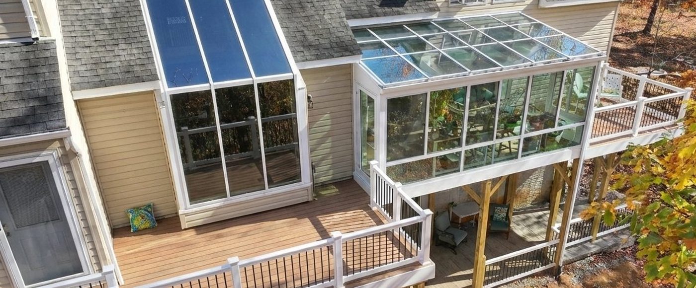 Stoneridge patio with sunroom and custom stairs