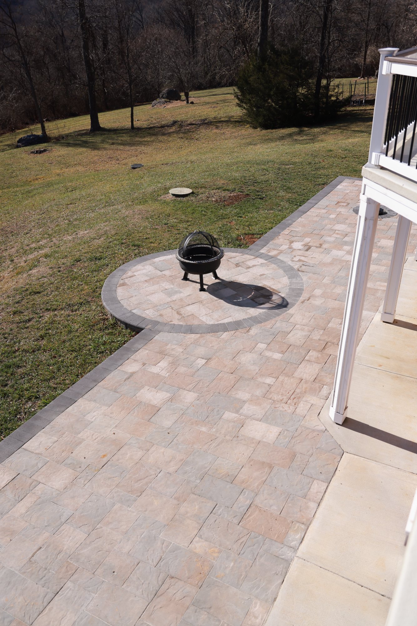 Paver patio with fire pit built by Stoneridge Decks near Leesburg, Virginia