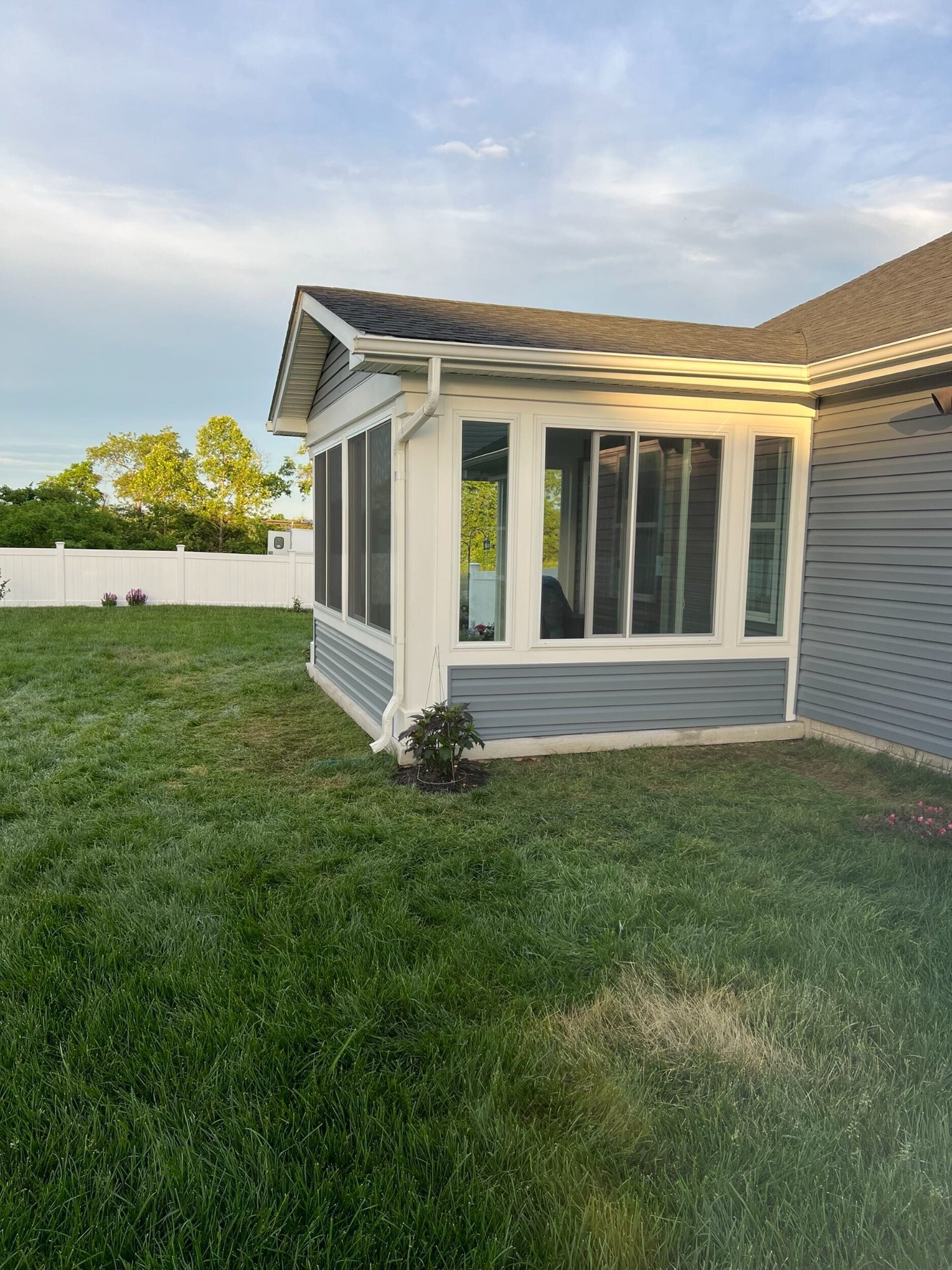 Porch enclosure matching house siding built by Stoneridge Decks in Virginia