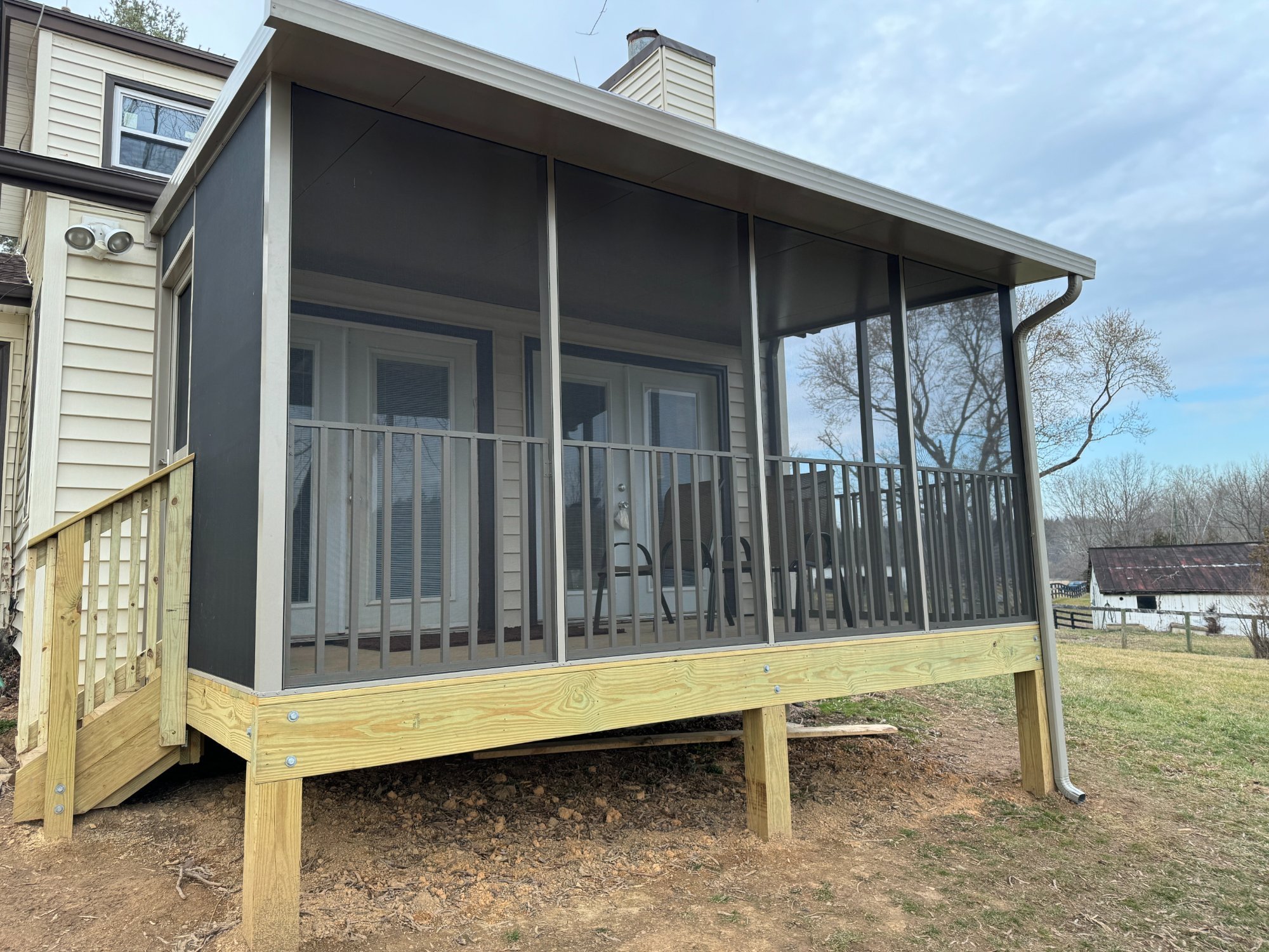 Pressure treated screen room built by Stoneridge Decks in Virginia