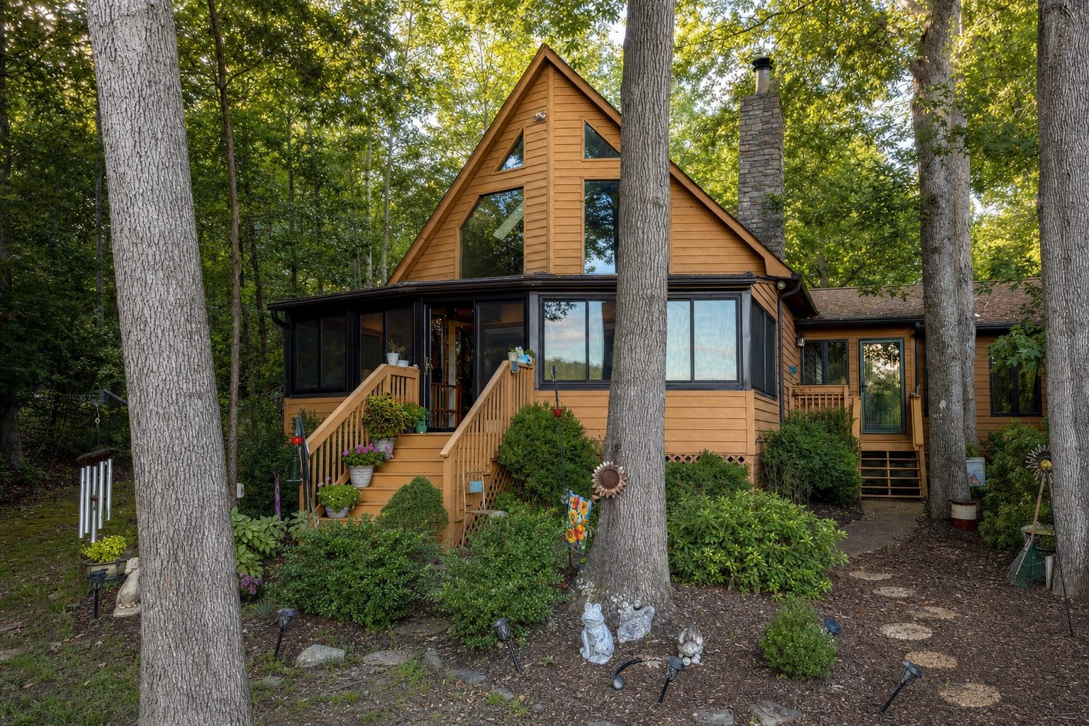 Sunroom addition on an A-frame cabin built by Stoneridge Decks in Louisa, Virginia
