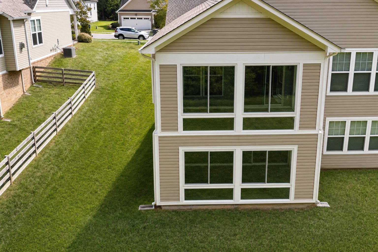 Sunroom addition side view built by Stoneridge Decks in Glen Allen, Virginia