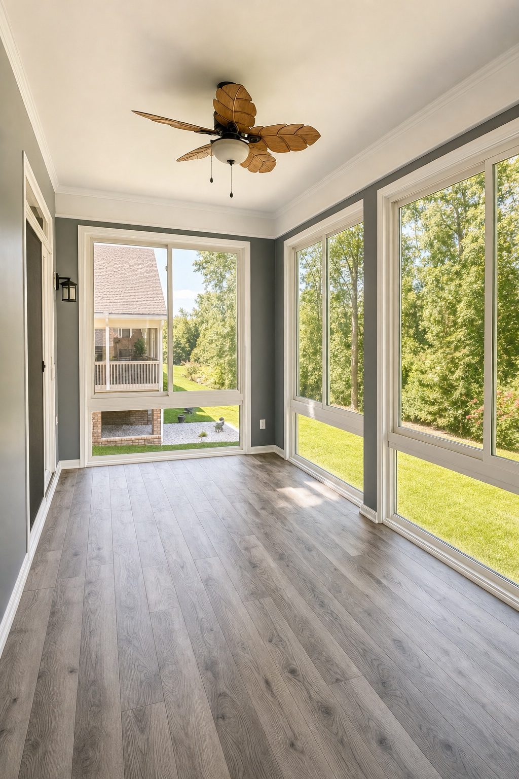 Sunroom interior with backyard view built by Stoneridge Decks in Glen Allen, Virginia