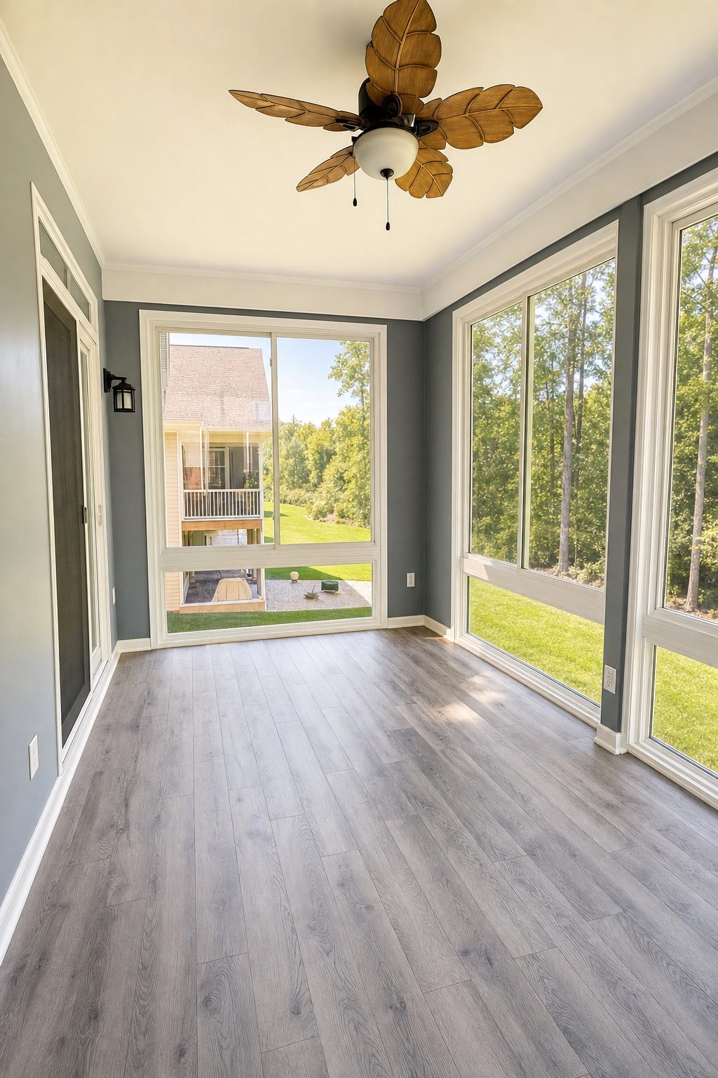 Sunroom interior with wood floors built by Stoneridge Decks in Glen Allen, Virginia